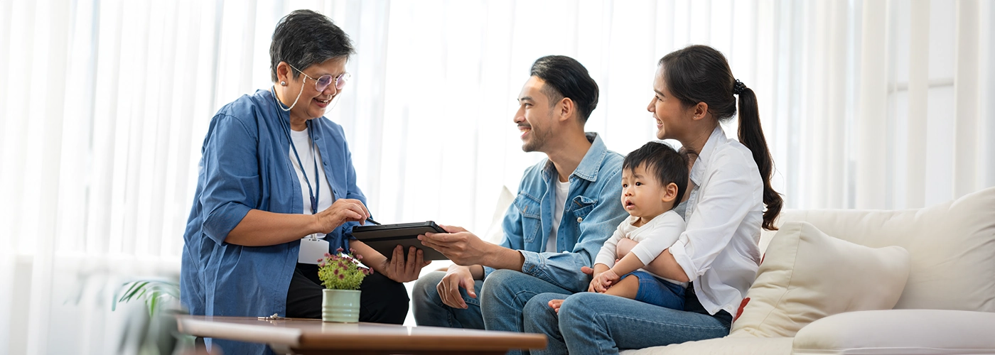 parents consulting with a paediatrician about their child’s allergies