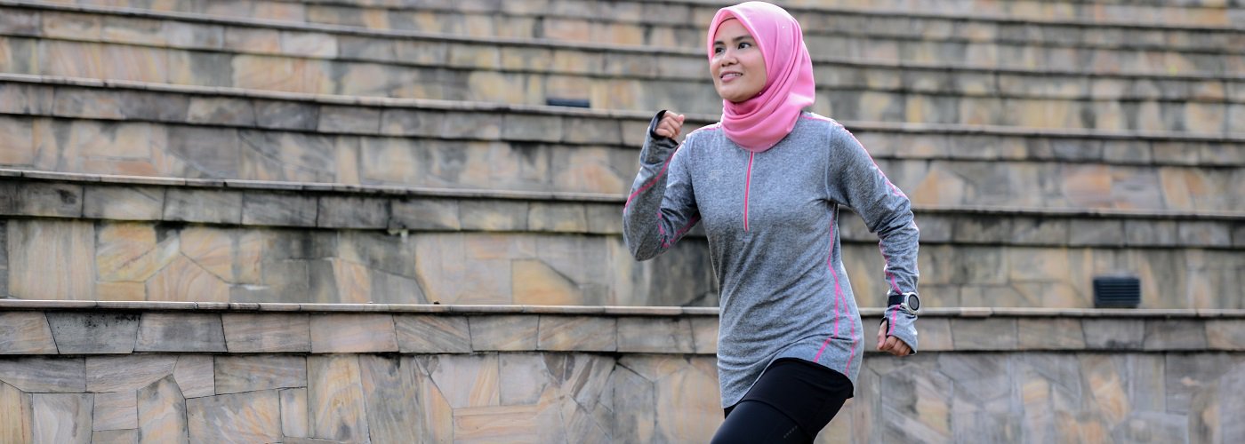 Woman jogging outdoors, promoting an active lifestyle and joint health
